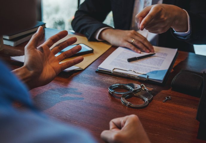 Legal team reviewing documents at conference table