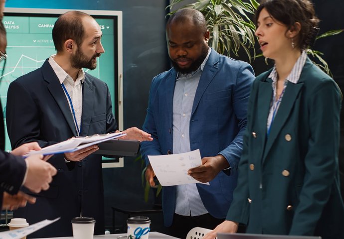 Professionals discussing legal matters outdoors